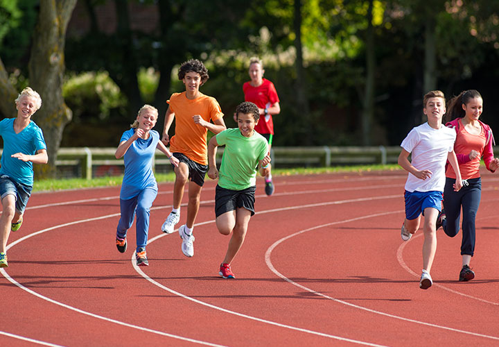 children running around running track
