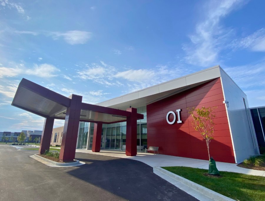 Contemporary medical facility with red exterior panels in Brownsburg, IN