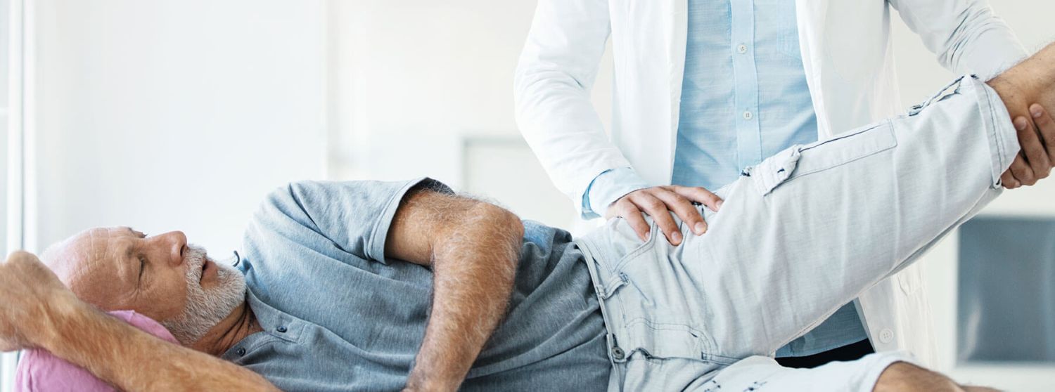 Physical Therapist Assisting Patient Rehabilitation Session